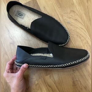 Like new UGG Black Leather Slip-Ons with Shearling Interior